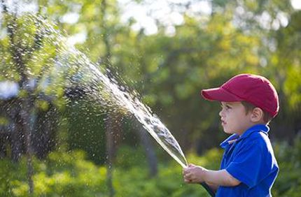 Boy Watering